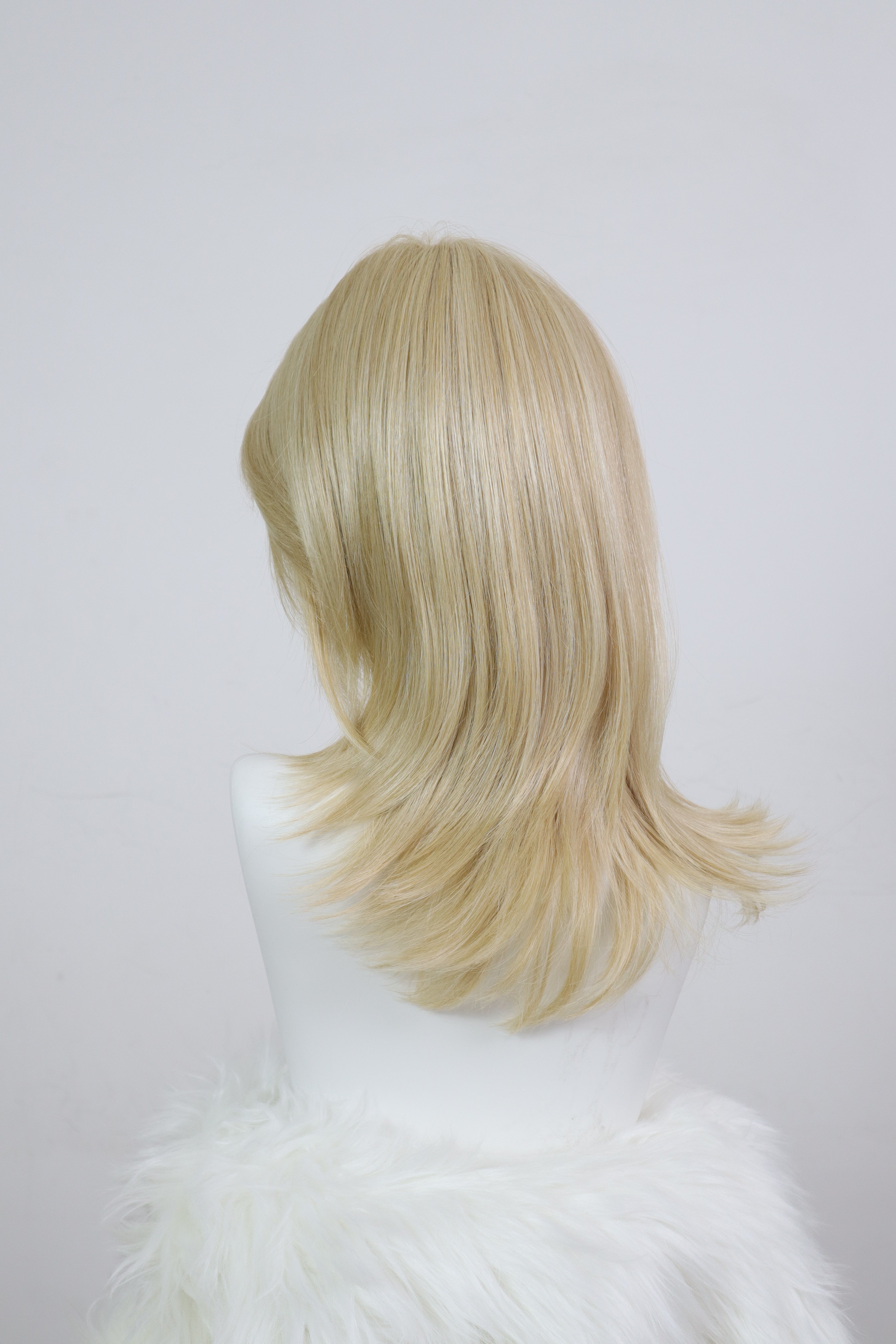 ADELE — Champagne Blonde Feathered Layers Mono Top Lace Front Wig